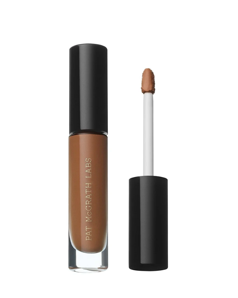 Pat McGrath Labs liquid contour in a clear tube with a black cap, shown next to its applicator wand on a white background.