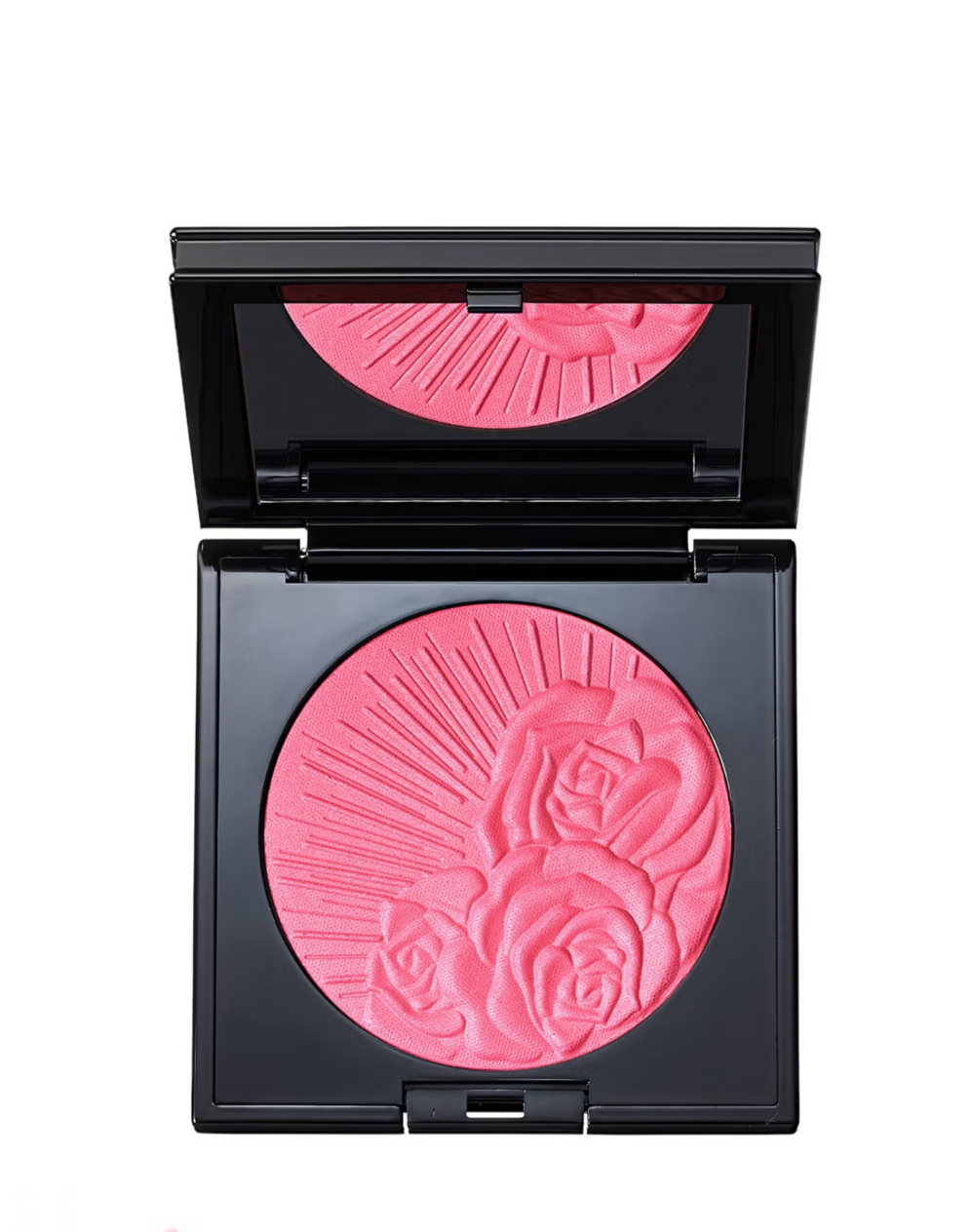 A black square makeup compact with the lid open, showing a round pink pressed powder blush with embossed rose and sunburst details. A matching pink reflection is visible in the inner lid mirror.